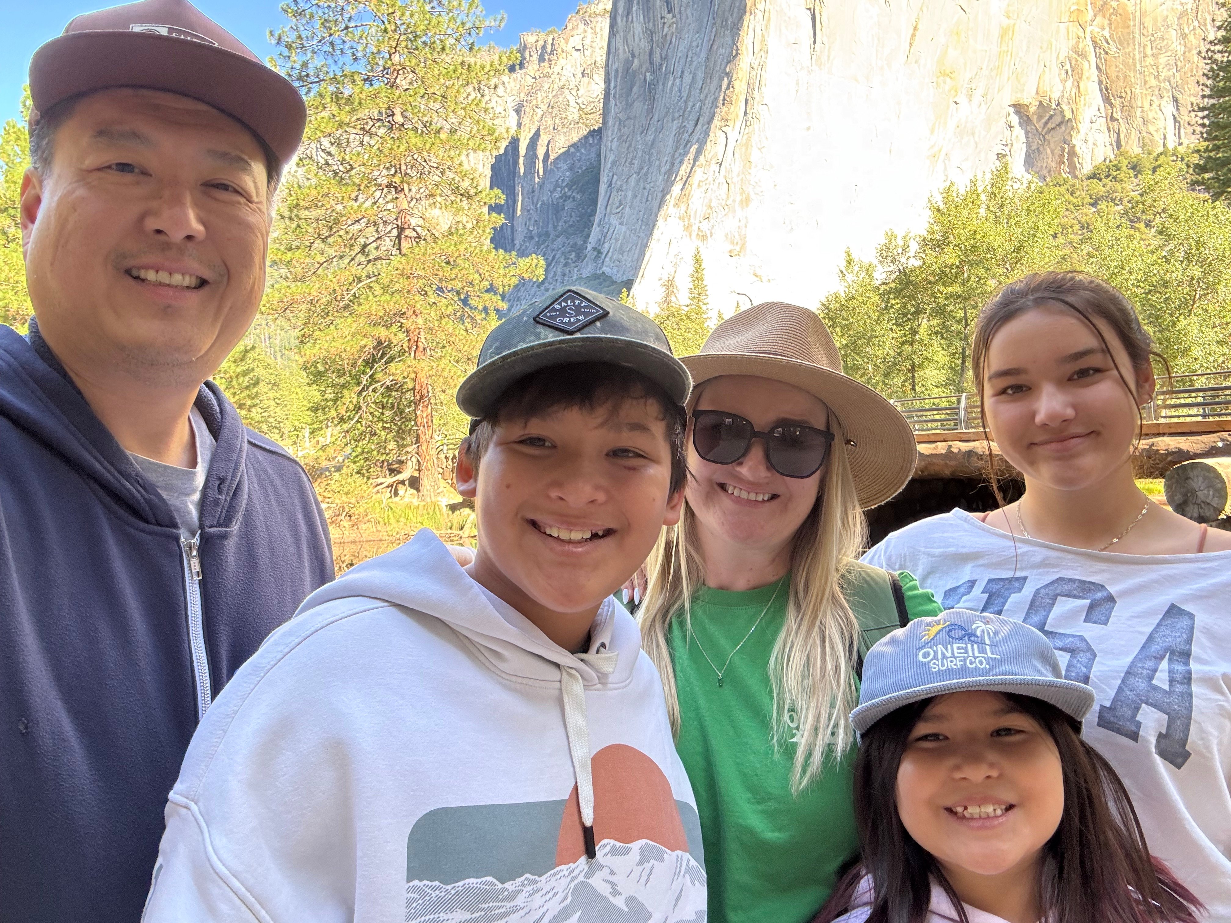 Ashleigh Chu with her husband and three children